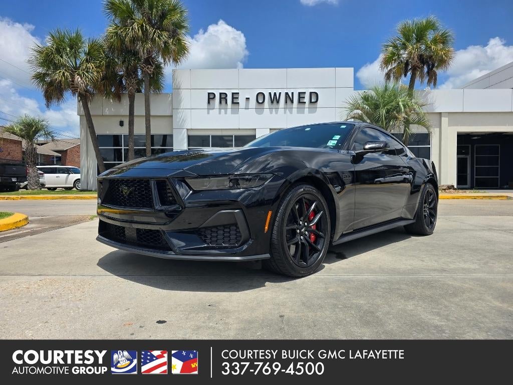 2024 Ford Mustang GT in Black — front three-quarter view