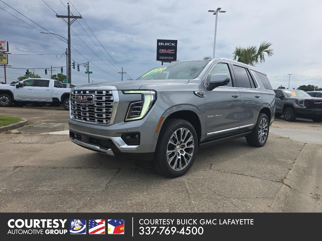 2026 GMC Yukon Denali in Sterling Metallic — front three-quarter view