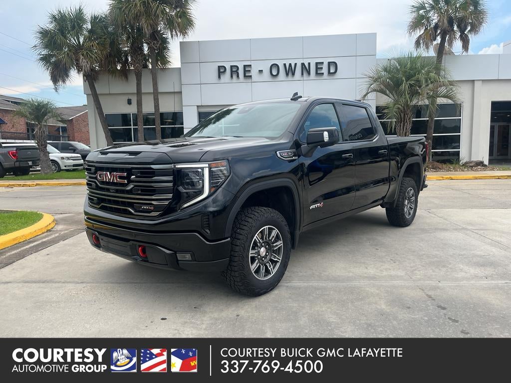 2025 GMC Sierra 1500 AT4 in Onyx Black — front three-quarter view
