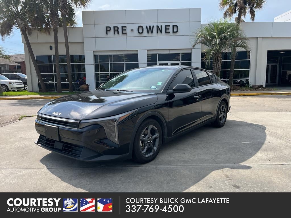 2025 Kia K4 LXS in Black — front three-quarter view