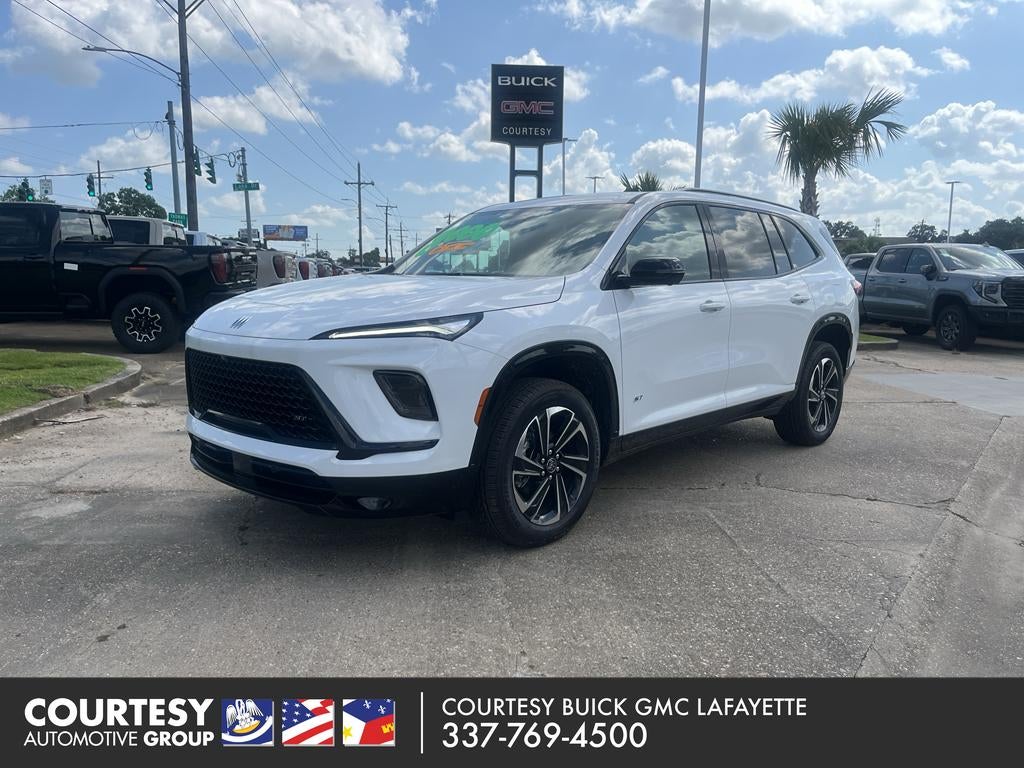 2026 Buick Enclave Sport Touring in Summit White — front three-quarter view