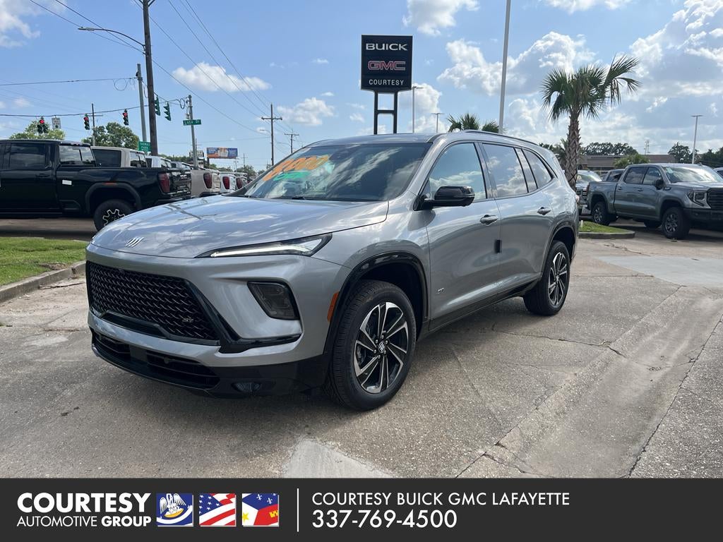 2026 Buick Enclave Sport Touring in Moonstone Gray Metallic — front three-quarter view